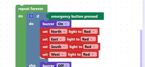 Blockly Builder mode: a traffic junction program that turns all lights red when the emergency button is pressed and moves a barrier for pedestrians